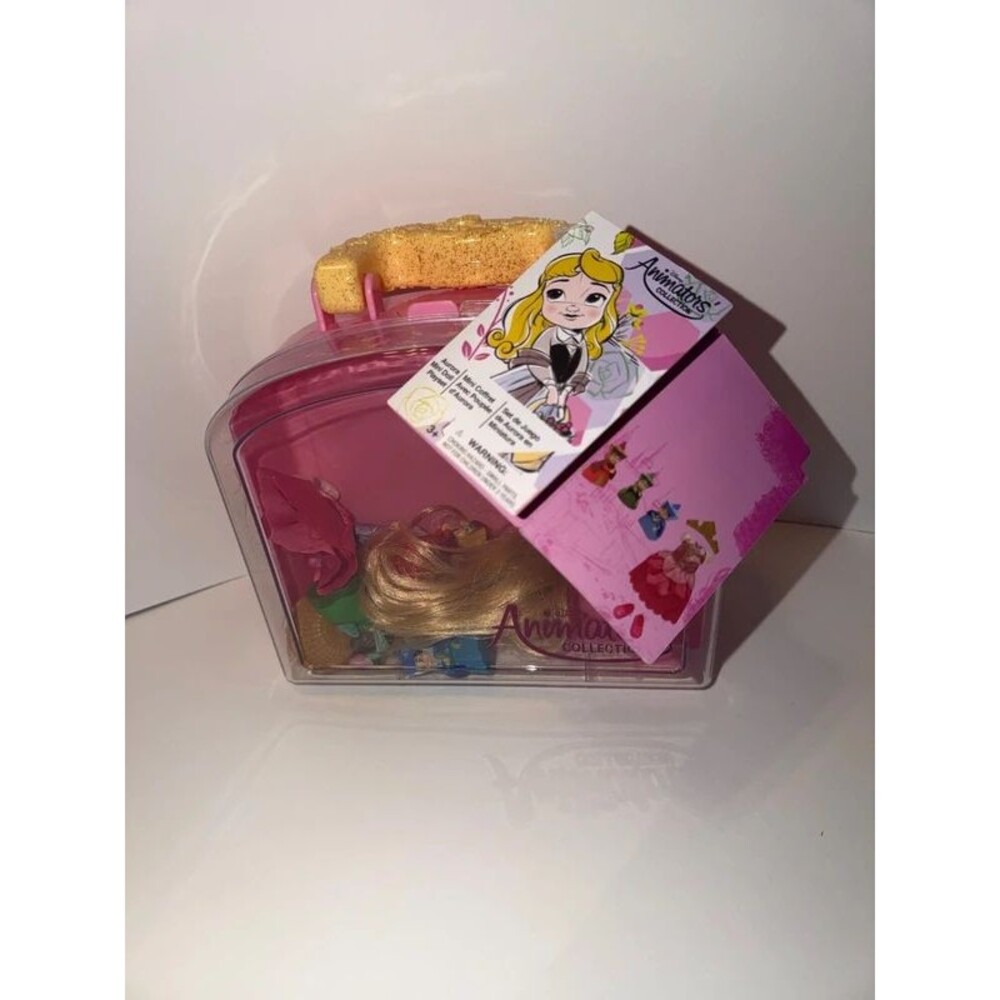 Aurora mini doll play